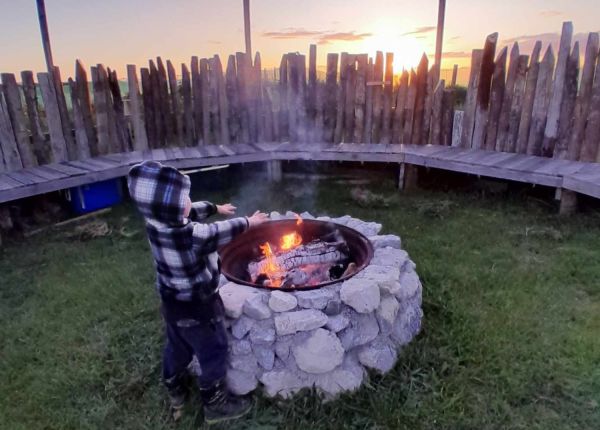 Staying warm on a chilly evening at Te Maramataka o Tamatea